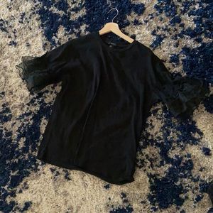 Simple black top with ruffle sleeve